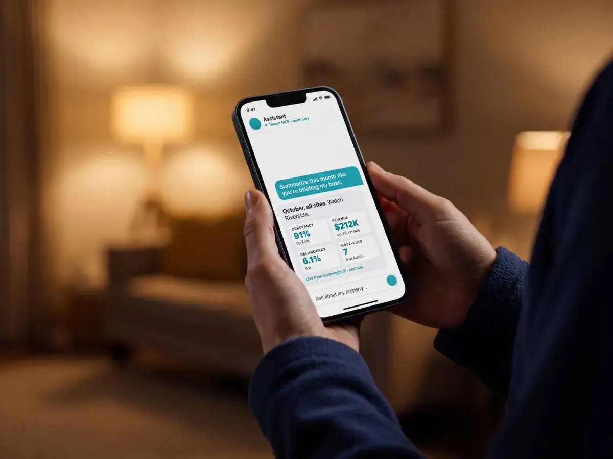 Operator reading a monthly summary for all sites from Tenant MCP on a phone